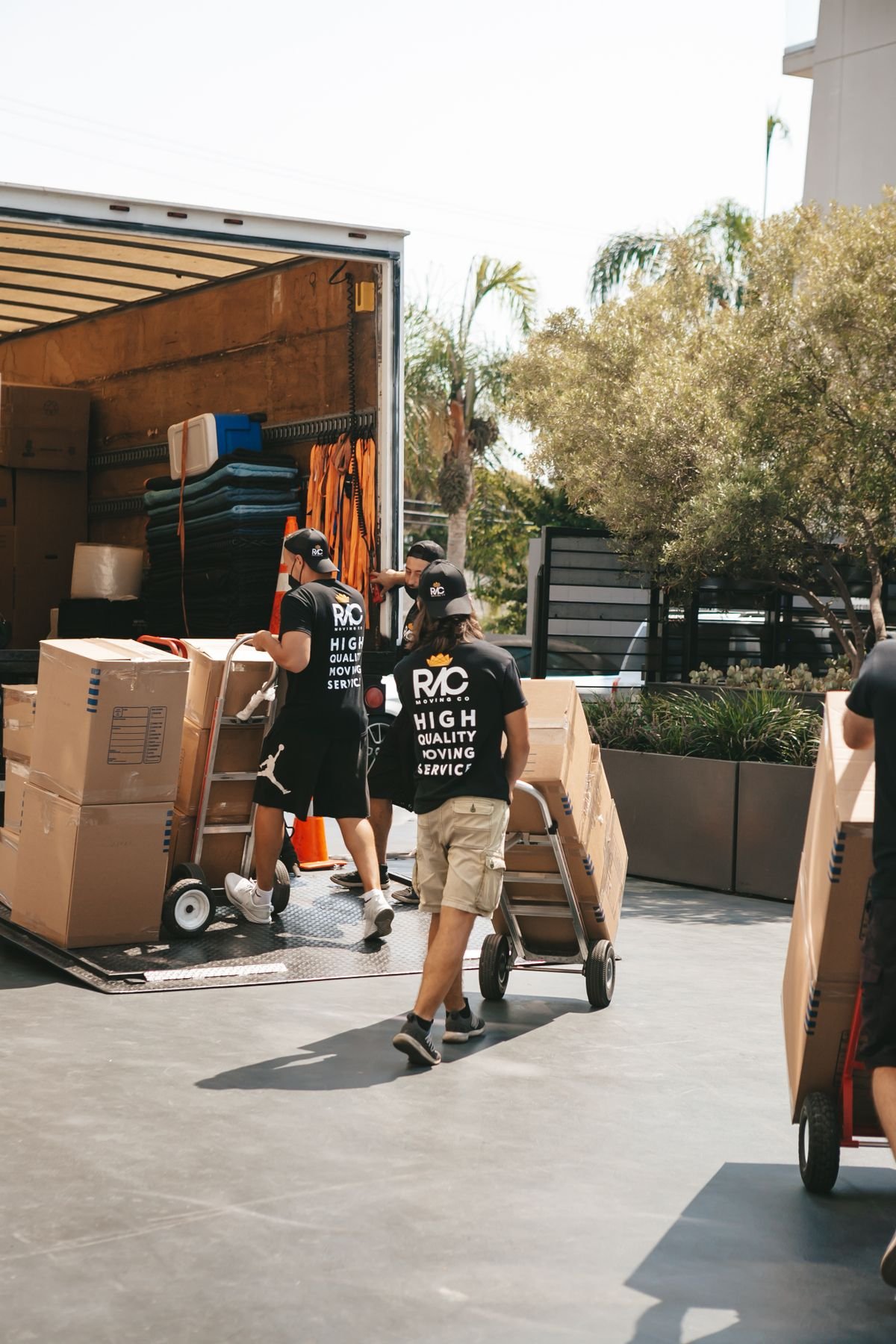 Professional dubai junk removal team loading furniture into a truck in Dubai