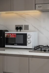 Professional appliance removal Dubai team clearing kitchen appliances