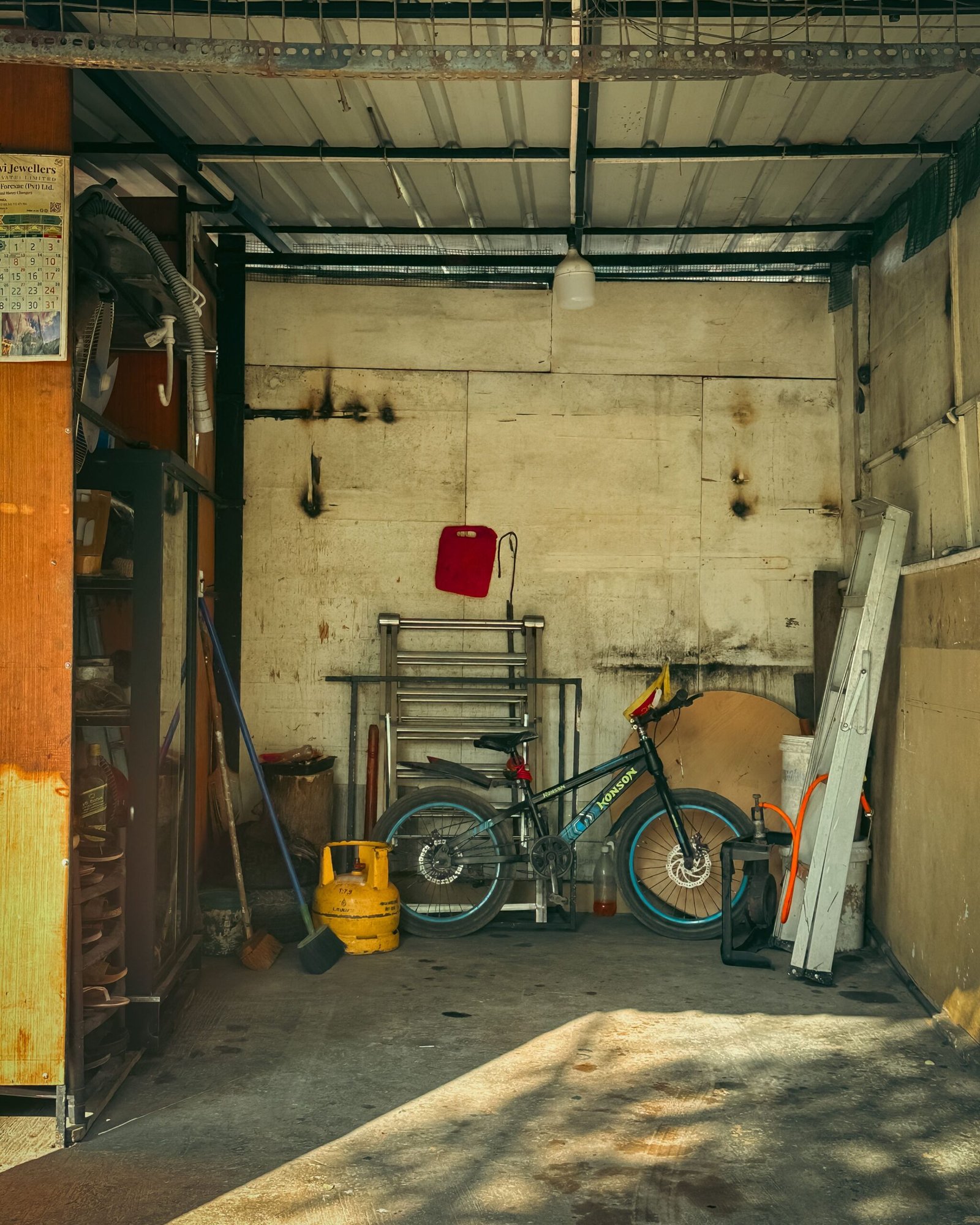 Dubai garage with bicycle, tools and storage items ready for a garage cleanout Dubai