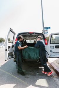 Removal team loading items into a van for junk collection in Dubai