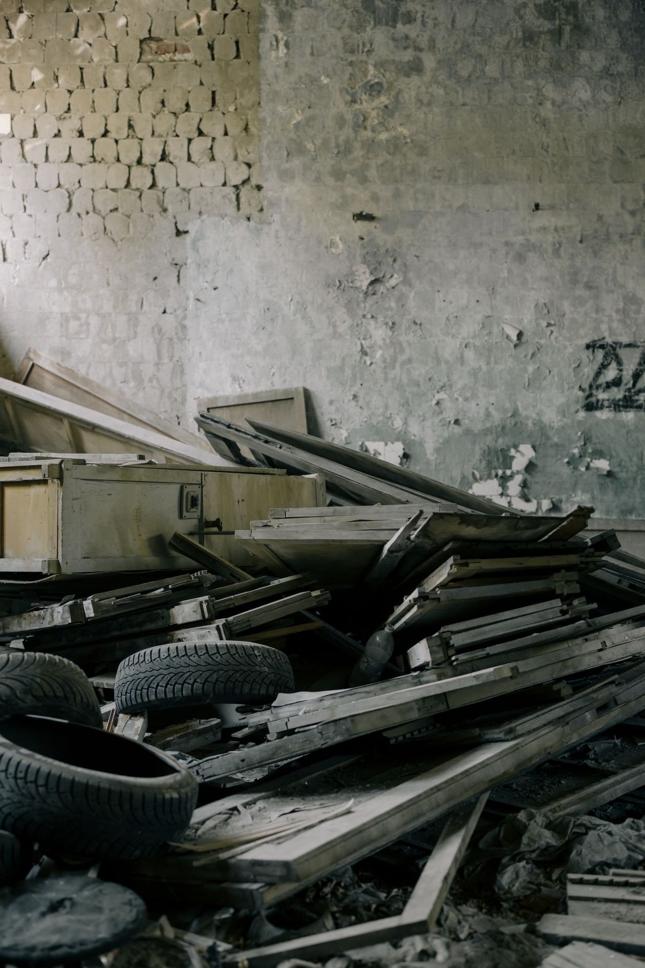 Cluttered room with broken furniture and old items awaiting junk removal in Dubai