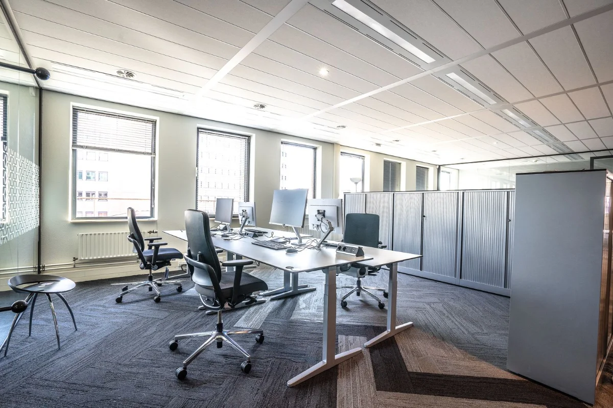 Workstations and monitors typically cleared during office relocation junk removal Dubai projects