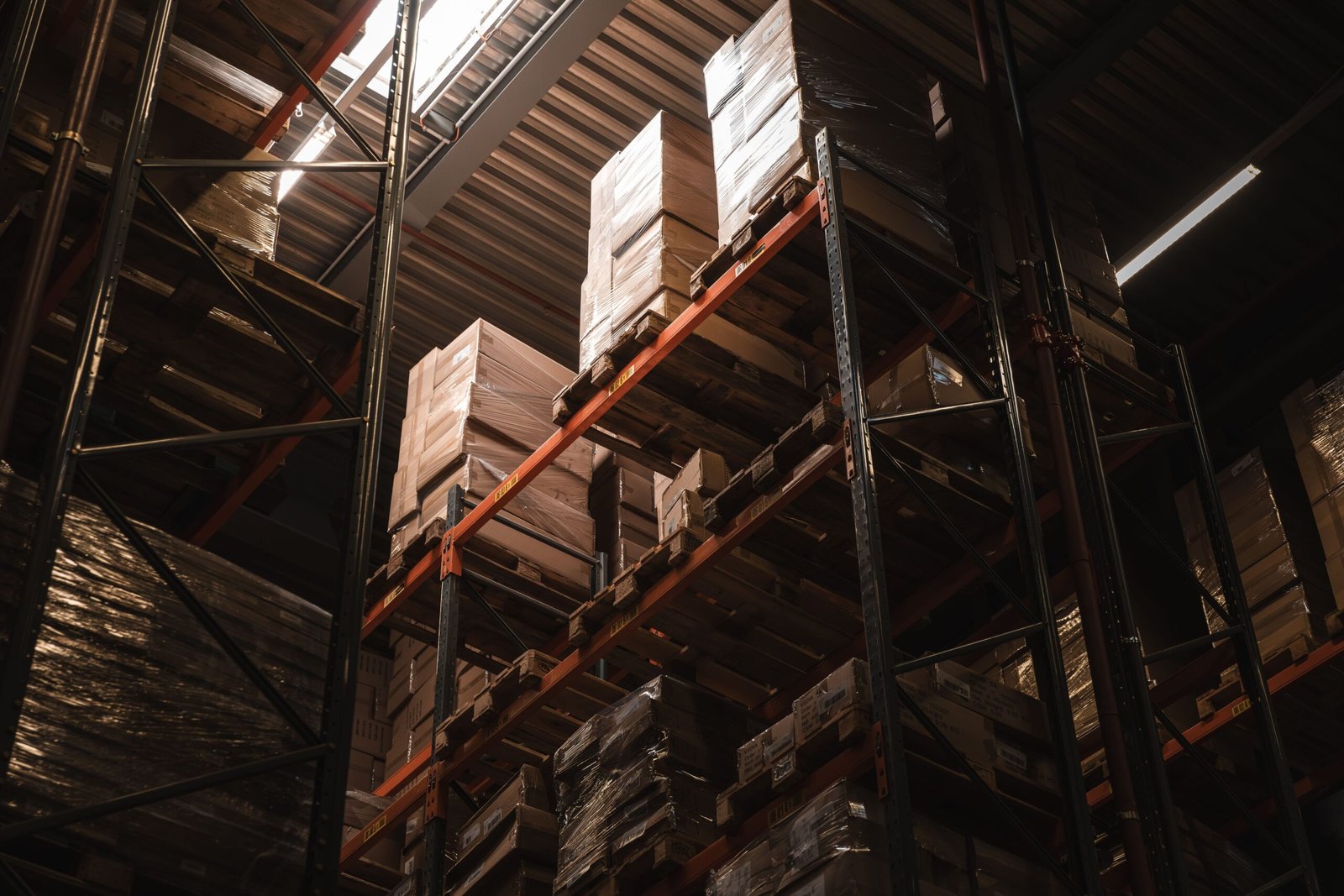 Boxes and stock on shelving cleared during a warehouse cleanout Dubai